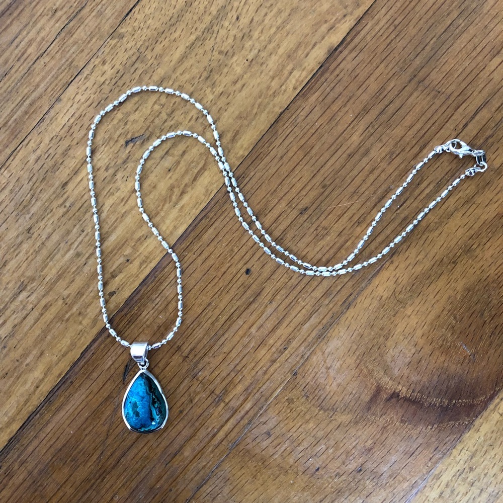 Blue stone pendant with silver chain